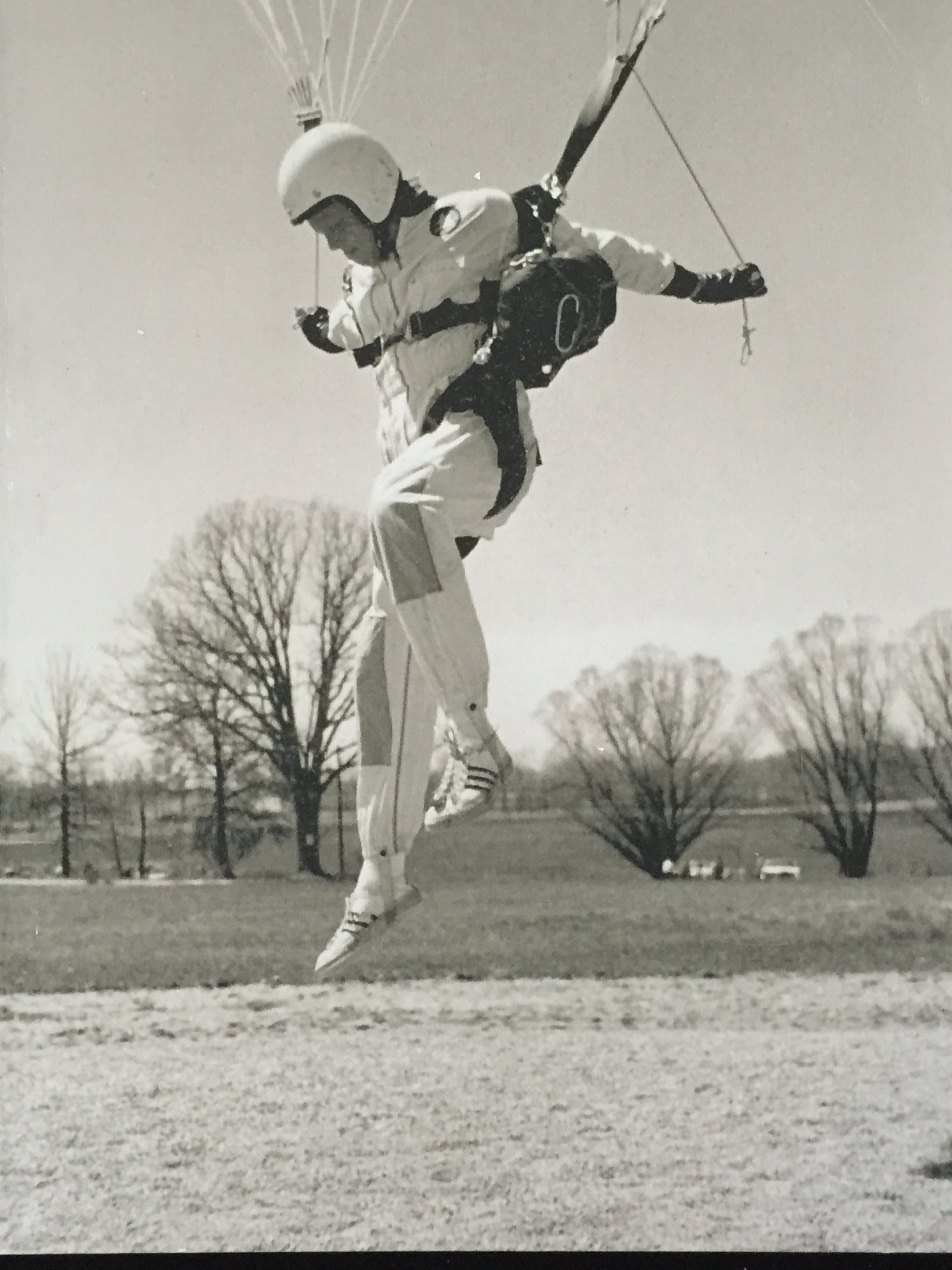 Bruce landing under parachute, c.1970s